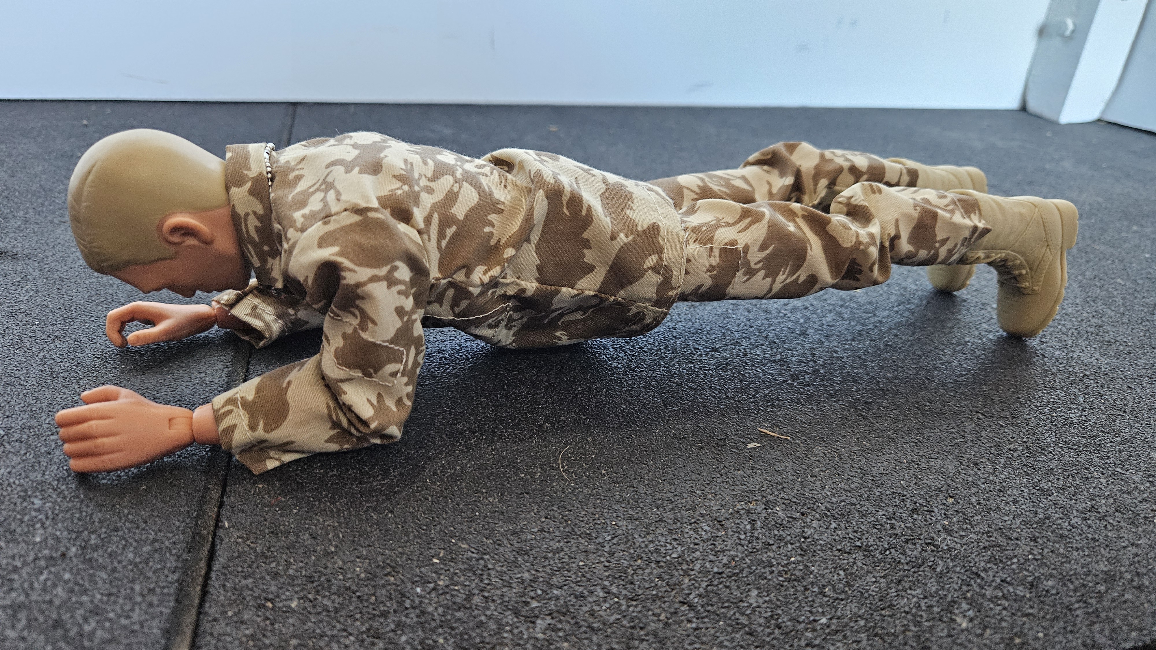 Action Man doing Forearm Plank